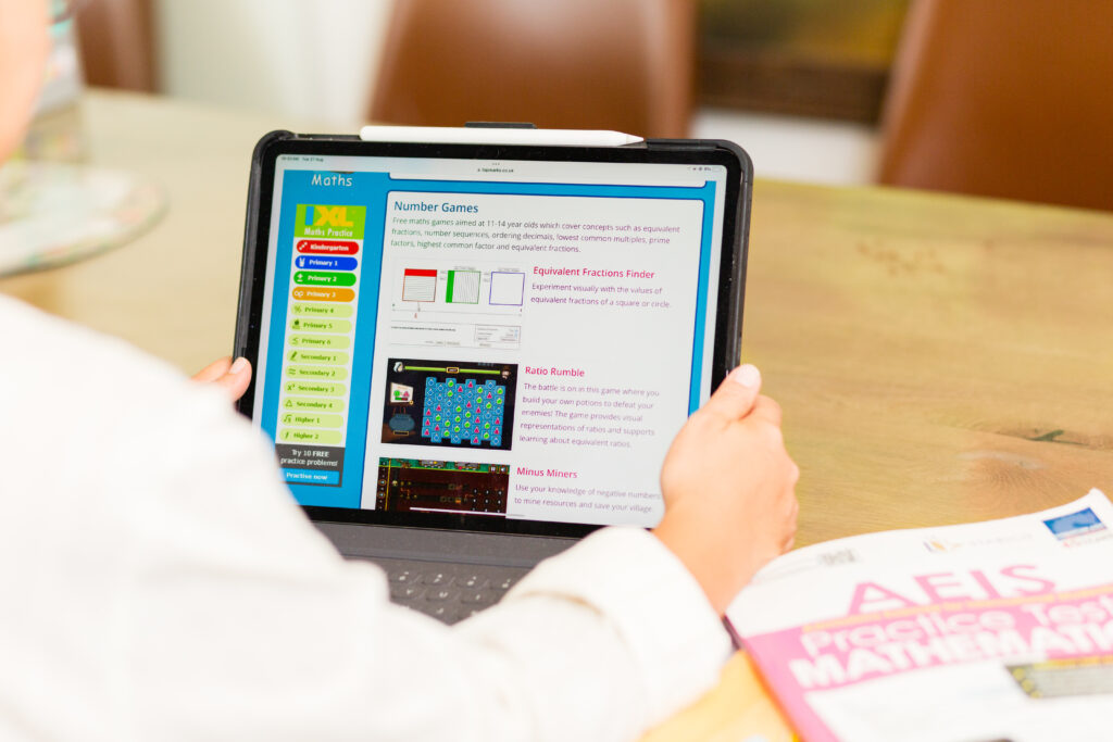 Student studying English & Math with AEIS Tuition in Singapore guided by private tutor.