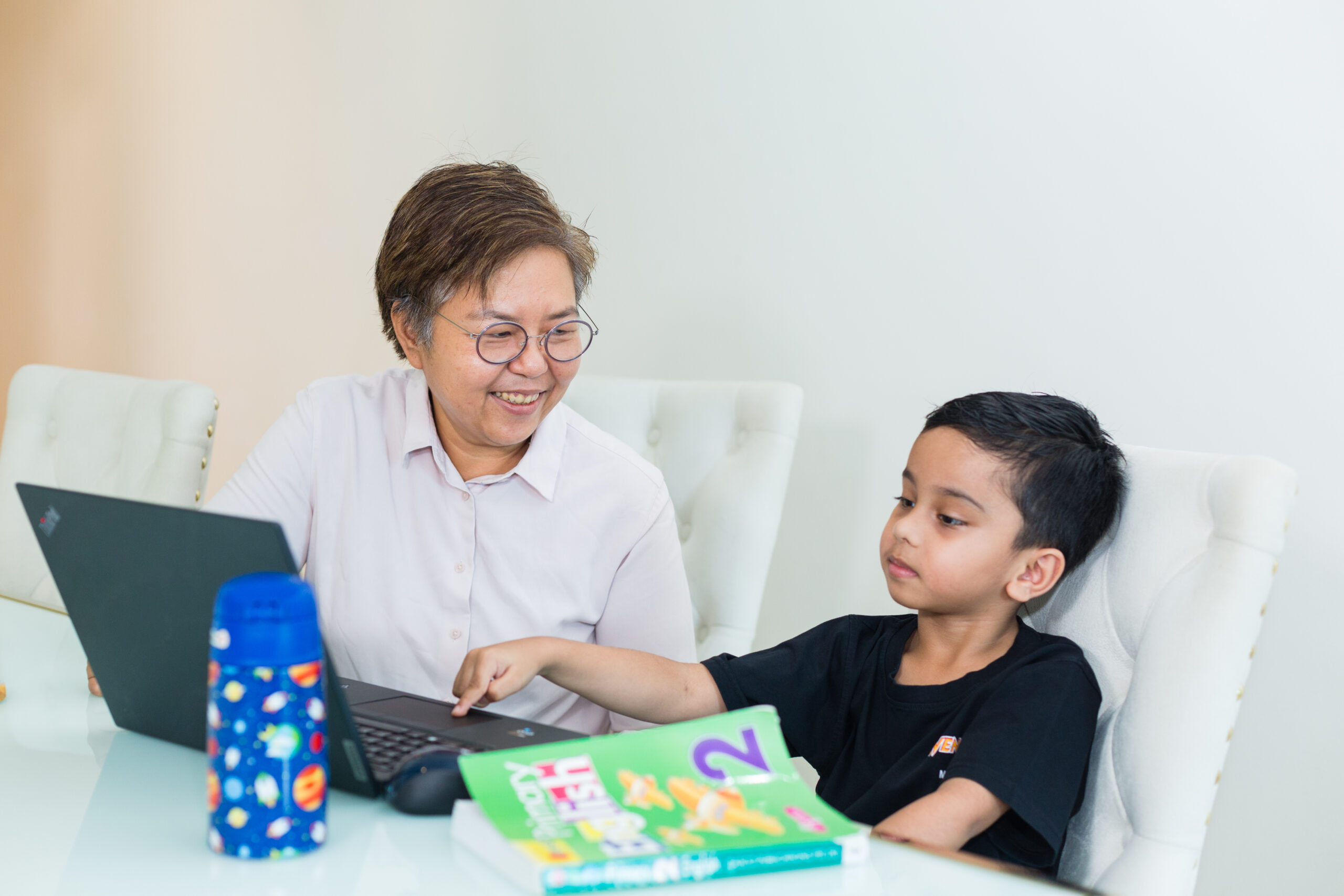 Ann Tutor guiding a student during the Ultimate 360 Programme — a 3-month intensive tuition in Singapore.